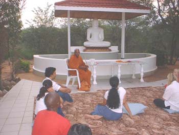 Blessing to devotees at the Botswana temple in 2006.jpg